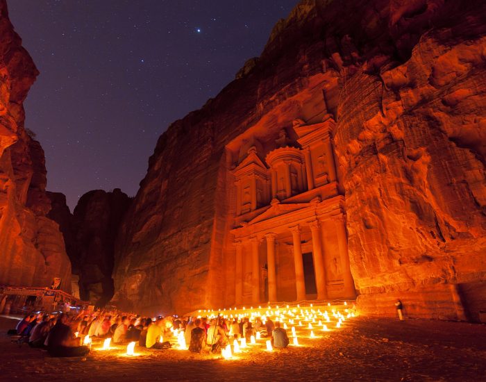 Petra by Night and sky full of stars